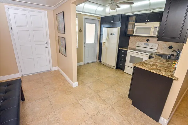 $153,000 | 2661 South Course Drive, Unit 707, Pompano Beach, FL 33069