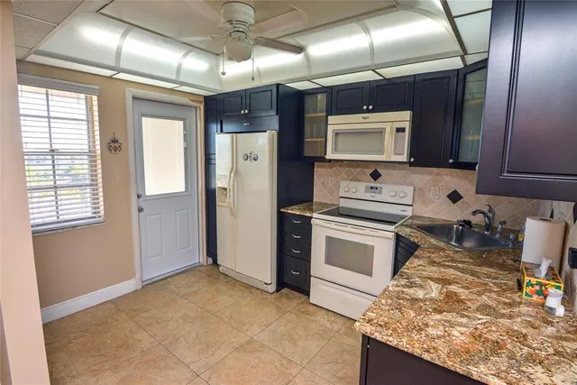 $153,000 | 2661 South Course Drive, Unit 707, Pompano Beach, FL 33069