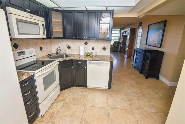 $153,000 | 2661 South Course Drive, Unit 707, Pompano Beach, FL 33069