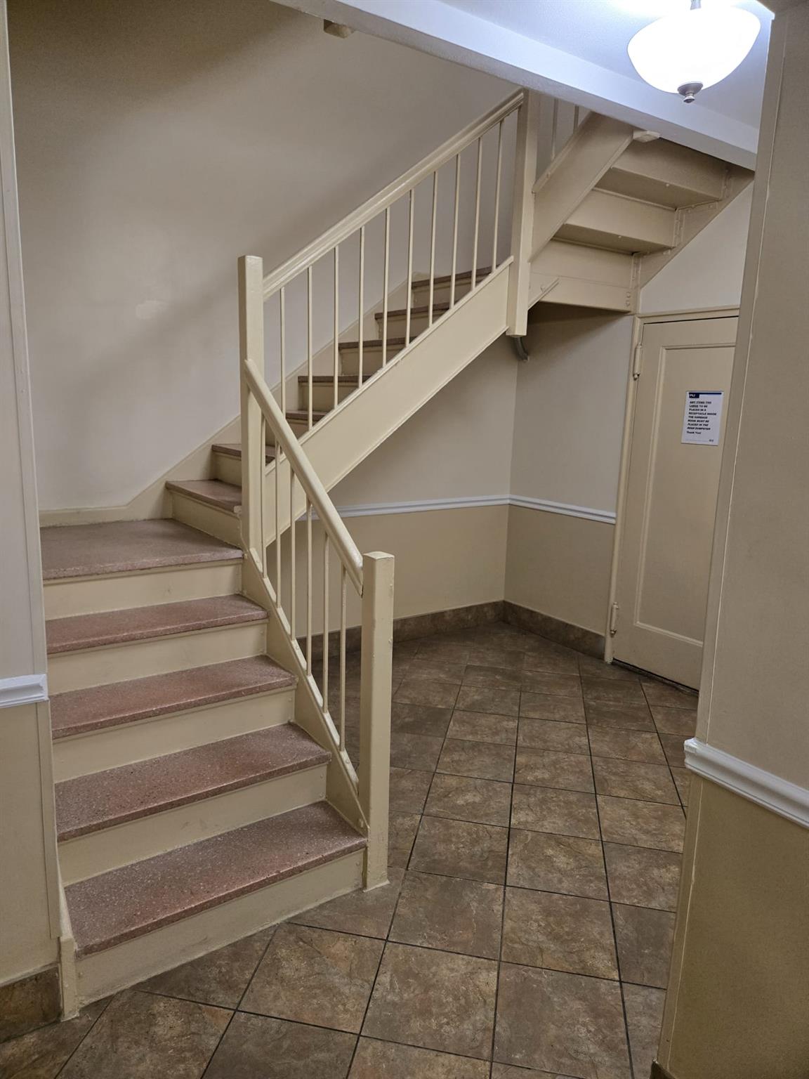801 Bronx River Road, Unit 2G Bronxville, NY 10708 - Photo 18 of 18 Staircase featuring baseboards and tile patterned flooring