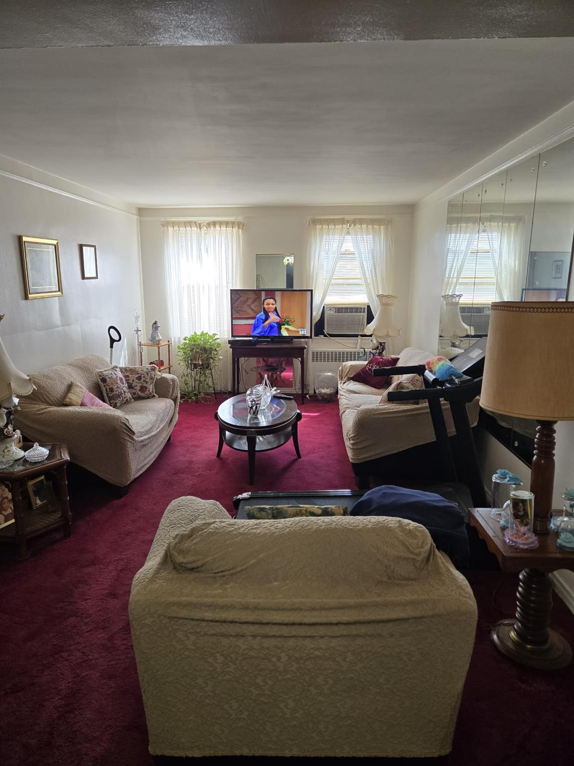 801 Bronx River Road, Unit 2G Bronxville, NY 10708 - Photo 10 of 18 Carpeted living area featuring a wealth of natural light and cooling unit