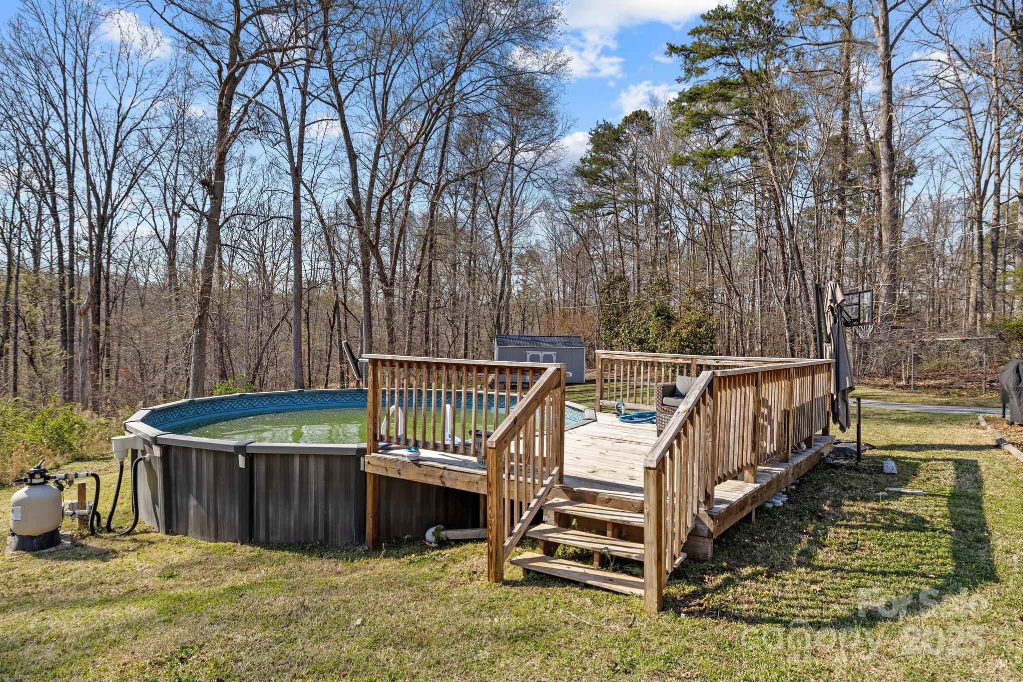 119 Old Hearth Road Clover, SC 29710 - Photo 33 of 39 a view of a deck with trees in front of house
