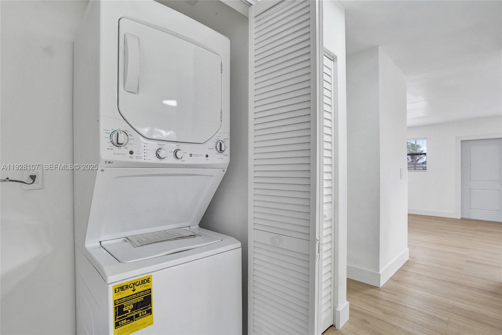 1960 Southwest 68th Way Miramar, FL 33023 - Photo 24 of 42 a utility room with dryer and washer