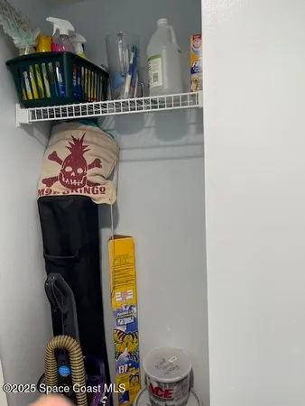 a spacious bedroom with a bed and a couch