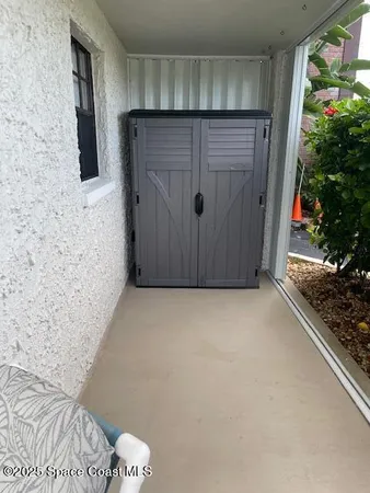 a view of swimming pool with seating space