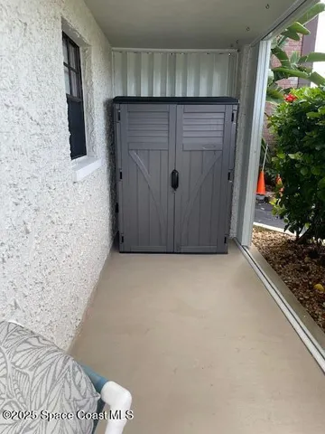 a view of swimming pool with seating space