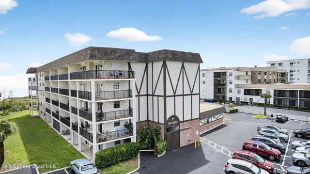 a kitchen with stainless steel appliances granite countertop a refrigerator sink and cabinets