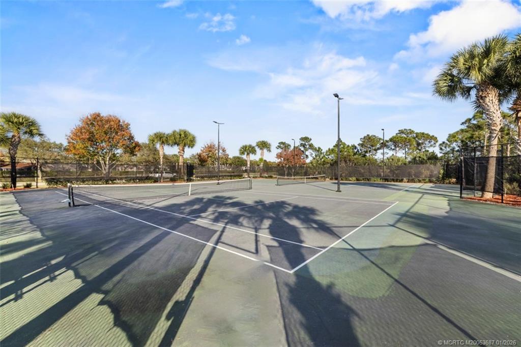 1171 Southeast Kirk Street Stuart, FL 34997 - Photo 41 of 47 a view of a tennis court
