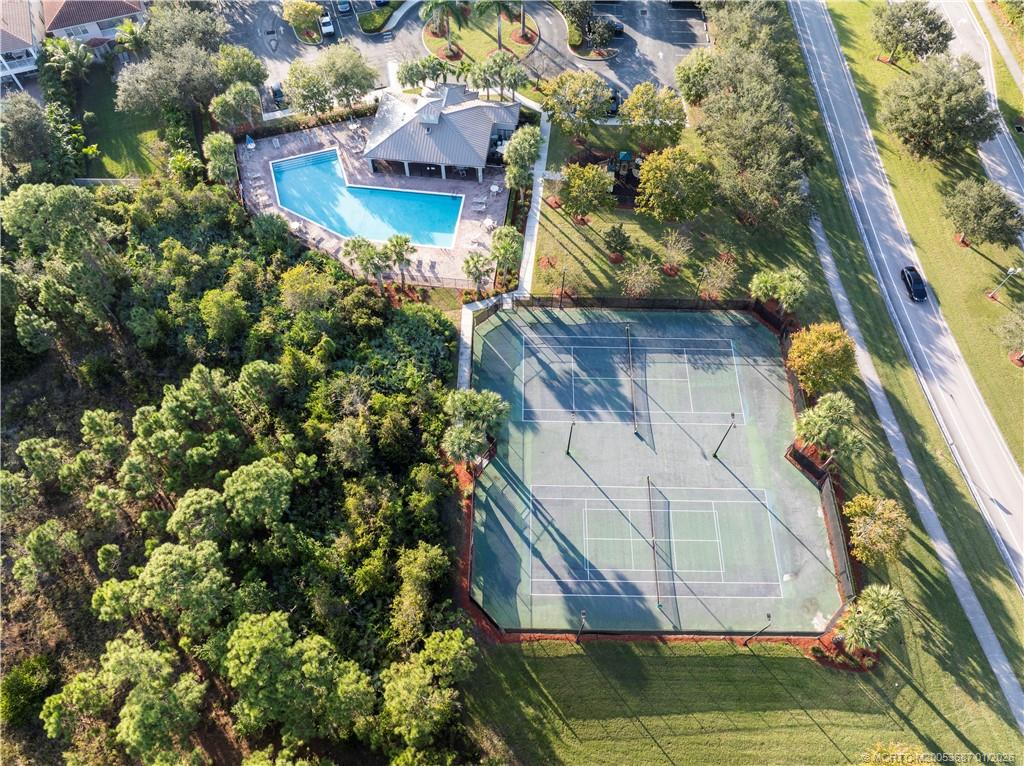 1171 Southeast Kirk Street Stuart, FL 34997 - Photo 45 of 47 a view of a tall building