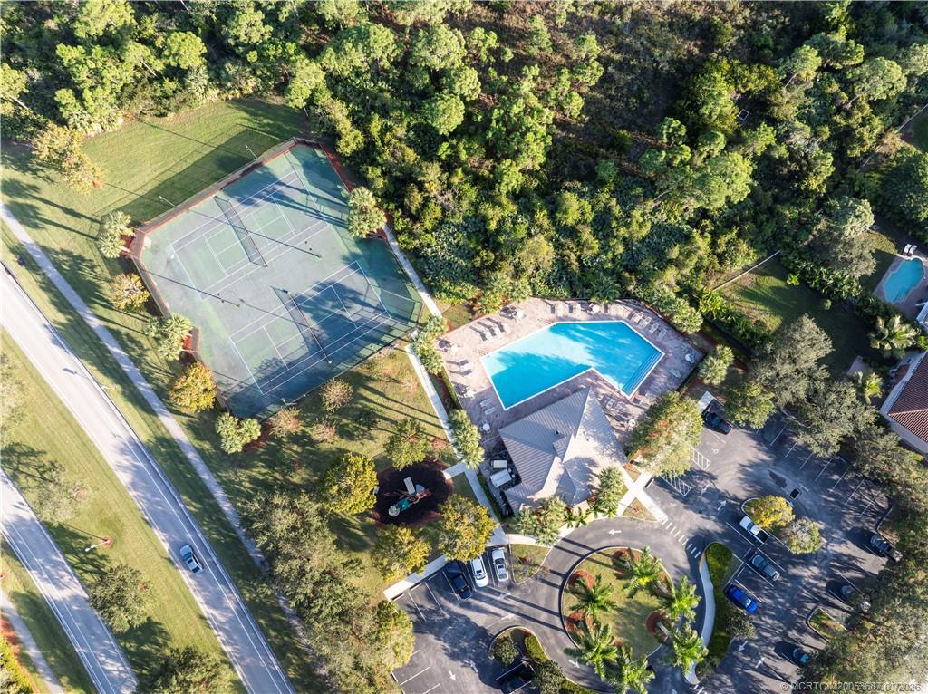 1171 Southeast Kirk Street Stuart, FL 34997 - Photo 46 of 47 a view of swimming pool with a yard