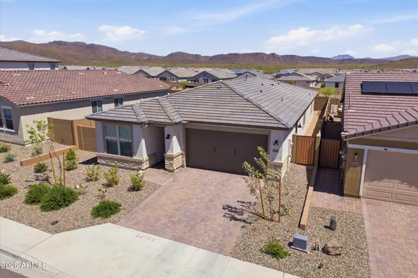 a view of a house with a patio