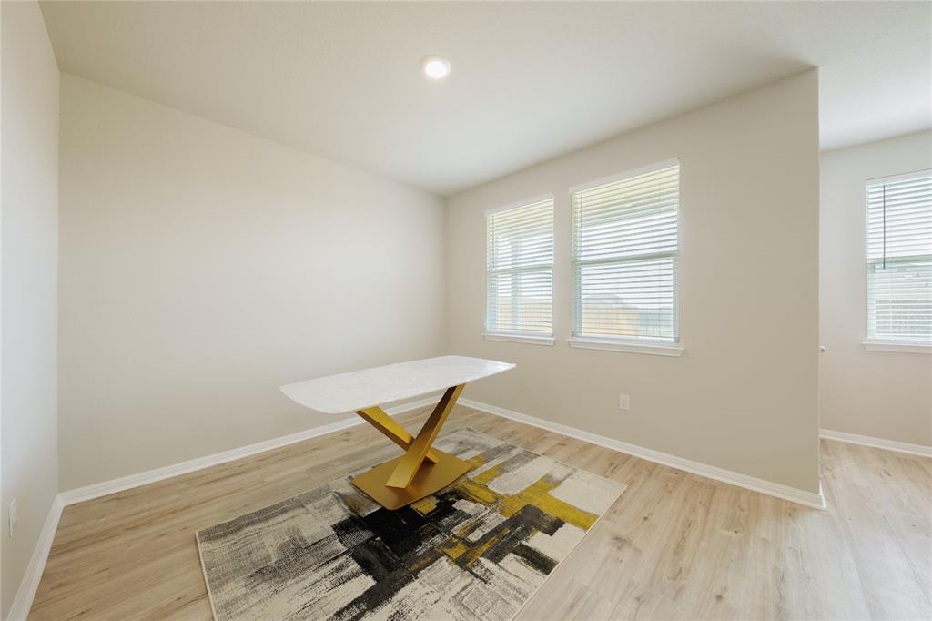 521 Otto Avenue Georgetown, TX 78626 - Photo 11 of 38 Office space with light wood-style floors, healthy amount of natural light, and recessed lighting