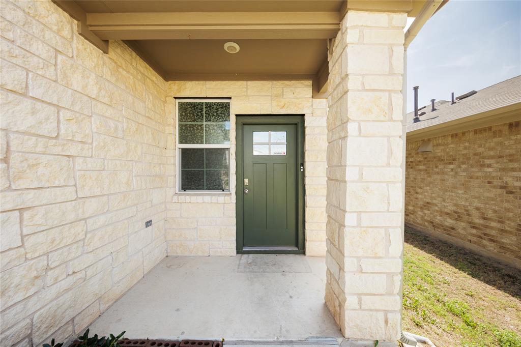 521 Otto Avenue Georgetown, TX 78626 - Photo 3 of 38 Entrance to property featuring stone siding