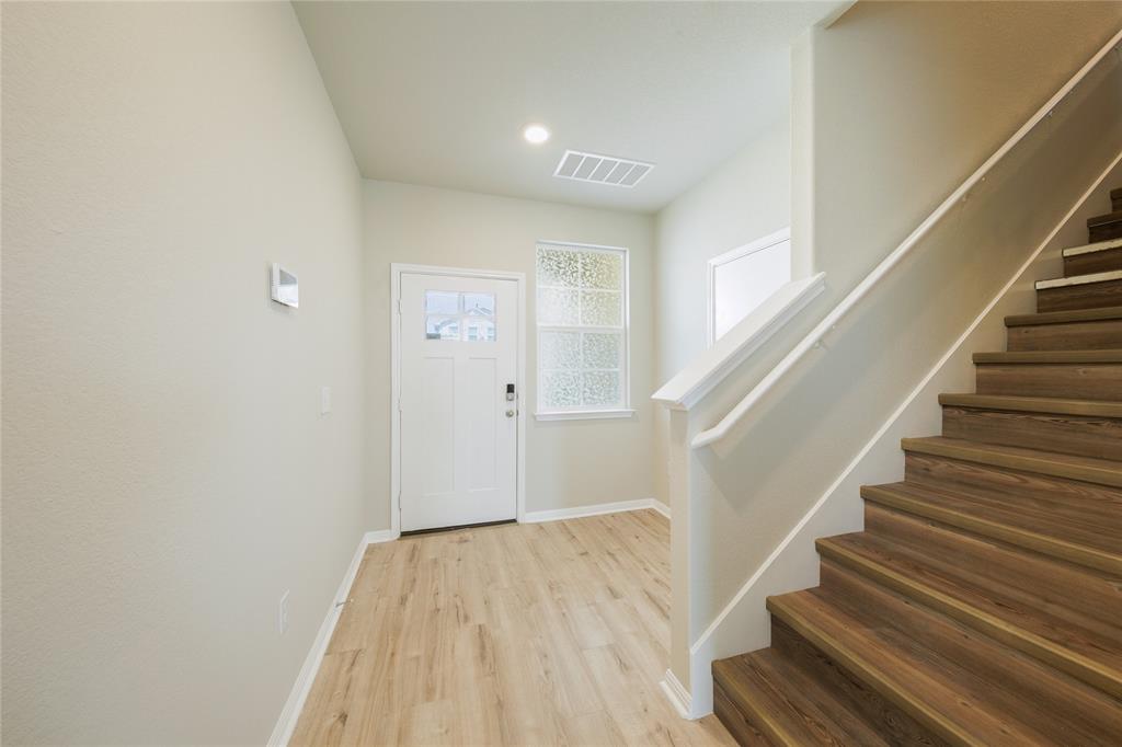 521 Otto Avenue Georgetown, TX 78626 - Photo 4 of 38 Entryway featuring light wood finished floors and recessed lighting