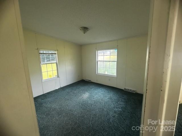 900 Grace Drive Stanley, NC 28164 - Photo 10 of 11 a view of empty room with window