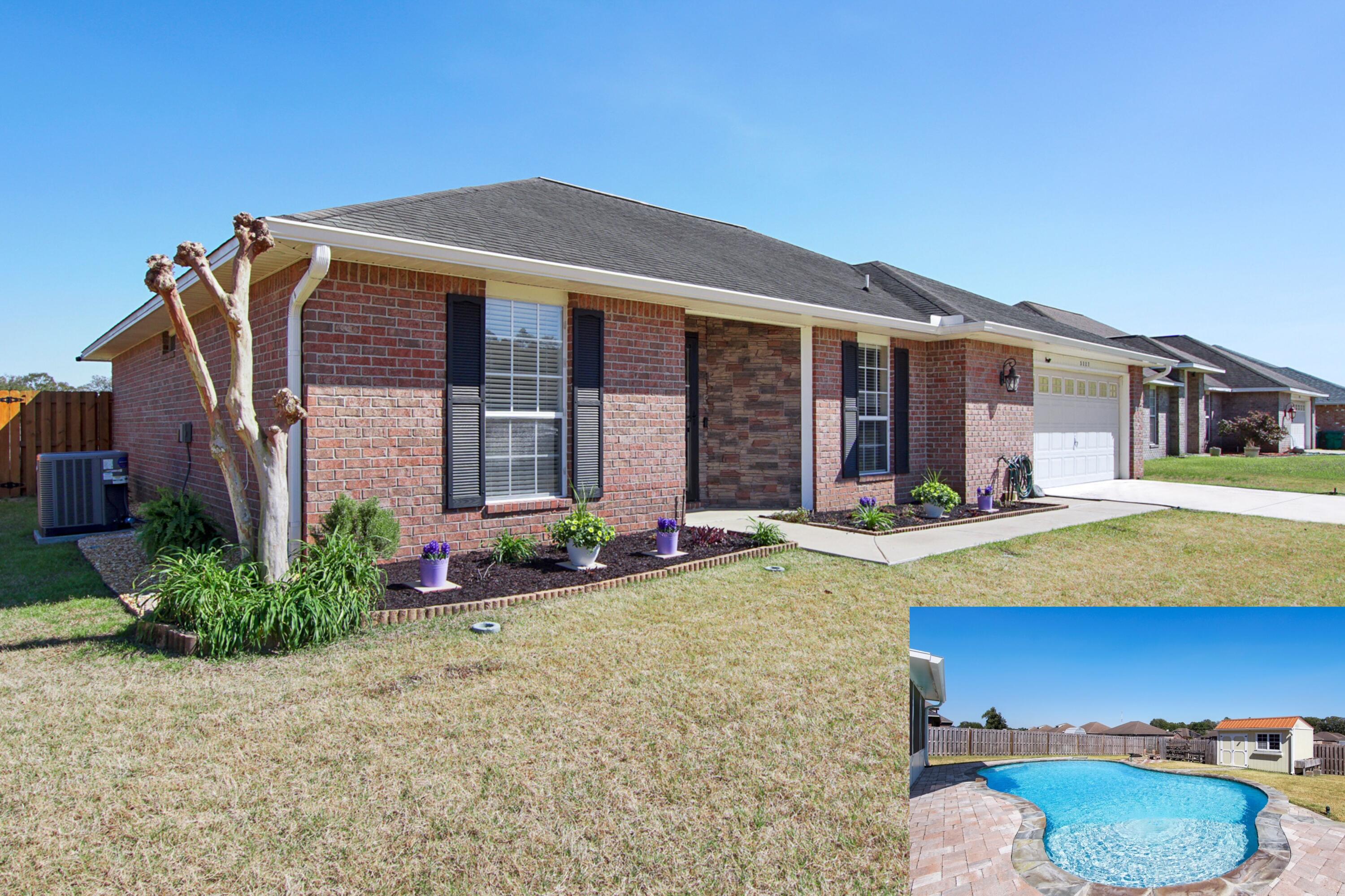 a front view of a house with swimming pool and porch