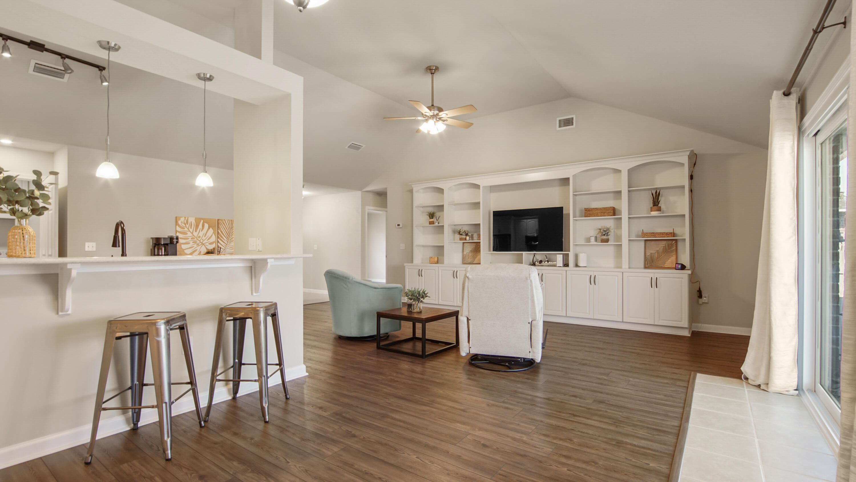 5227 Moore Loop Crestview, FL 32536 - Photo 15 of 43 a view of a livingroom with furniture and wooden floor