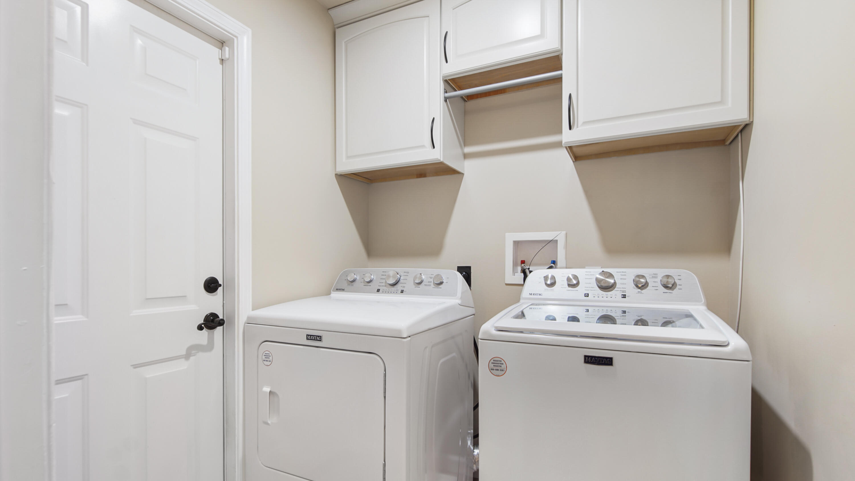 5227 Moore Loop Crestview, FL 32536 - Photo 19 of 43 a utility room with dryer and washer