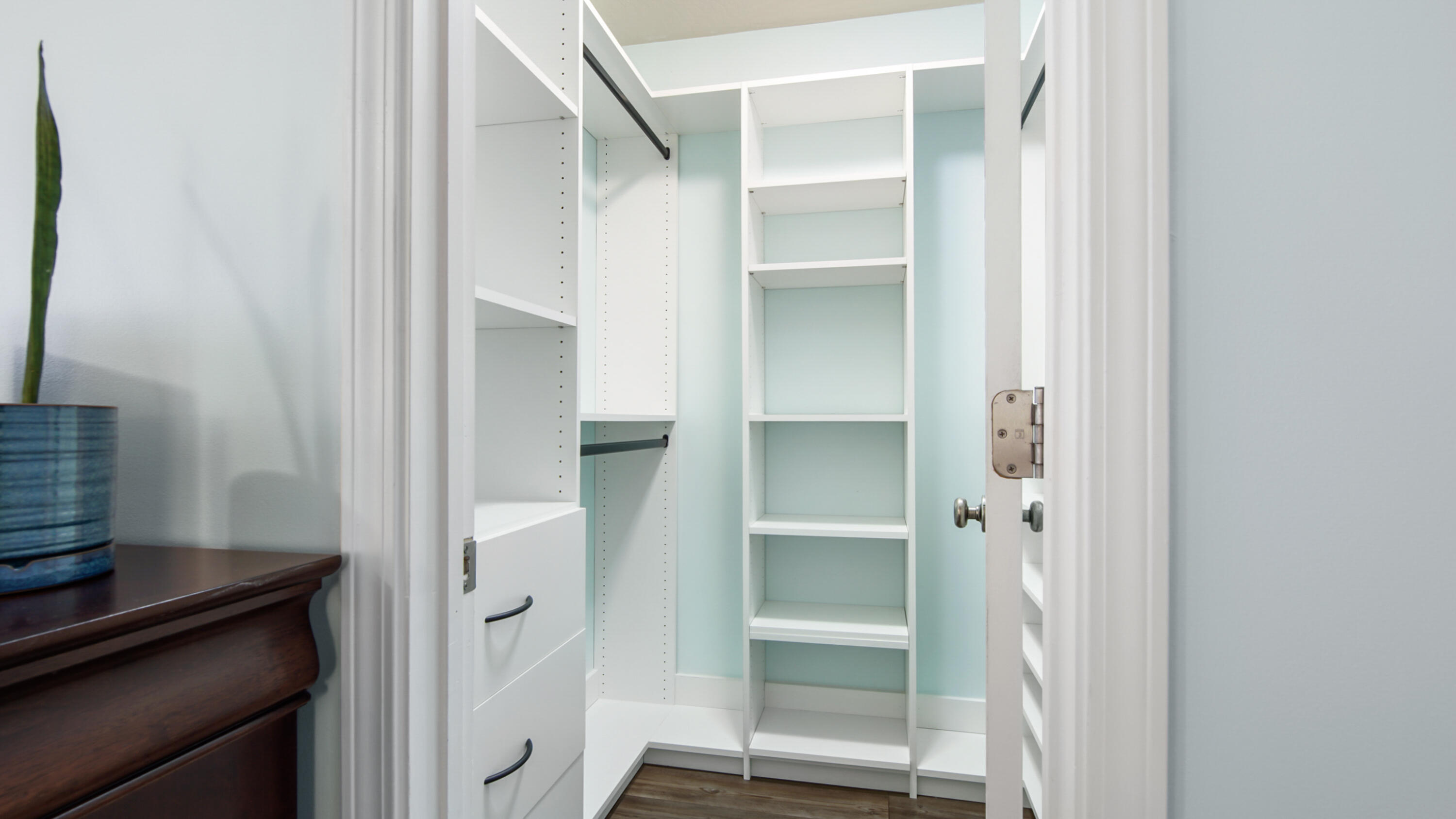 5227 Moore Loop Crestview, FL 32536 - Photo 24 of 43 a view of walk in closet with empty racks