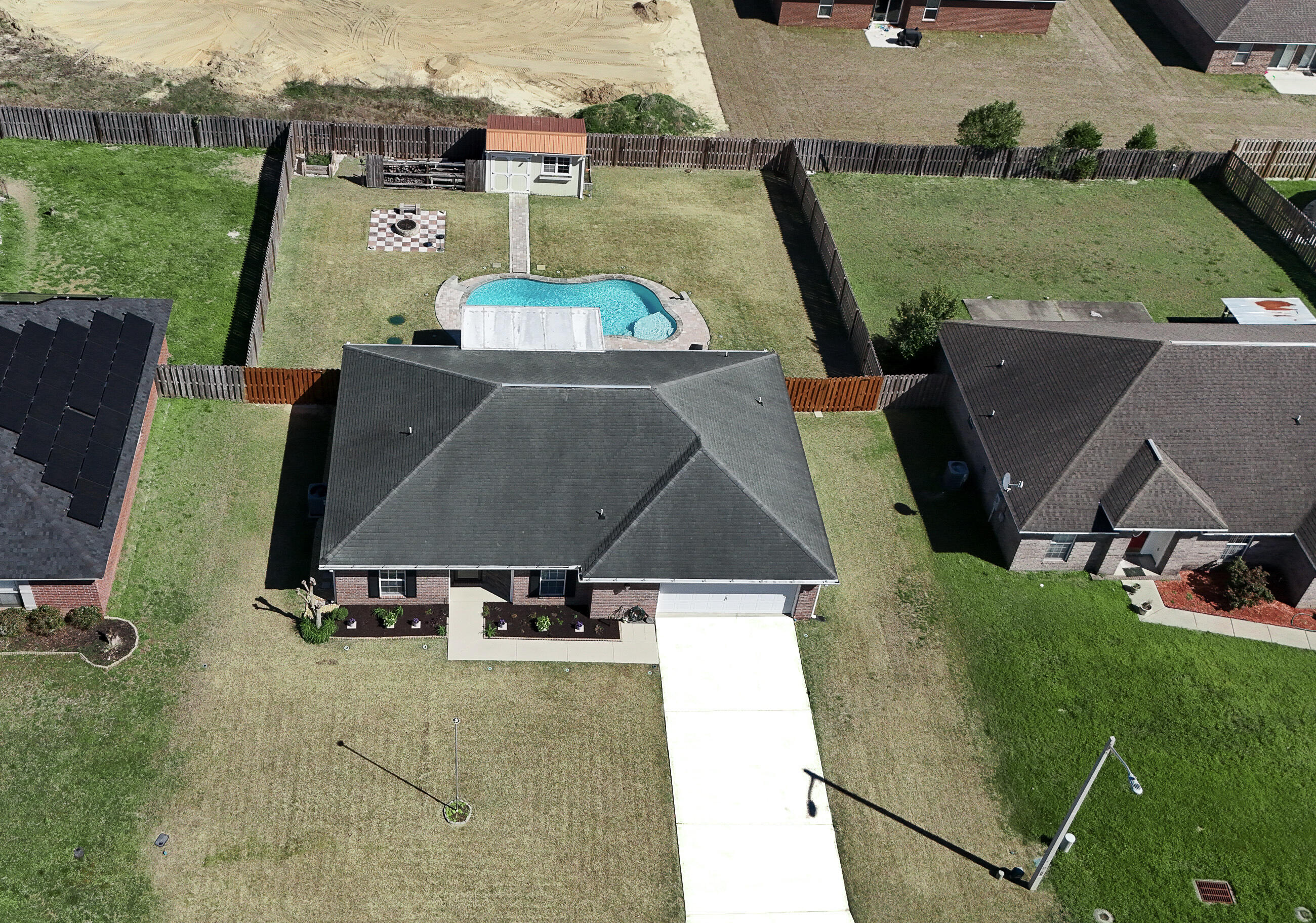 5227 Moore Loop Crestview, FL 32536 - Photo 8 of 43 an aerial view of a house with a yard