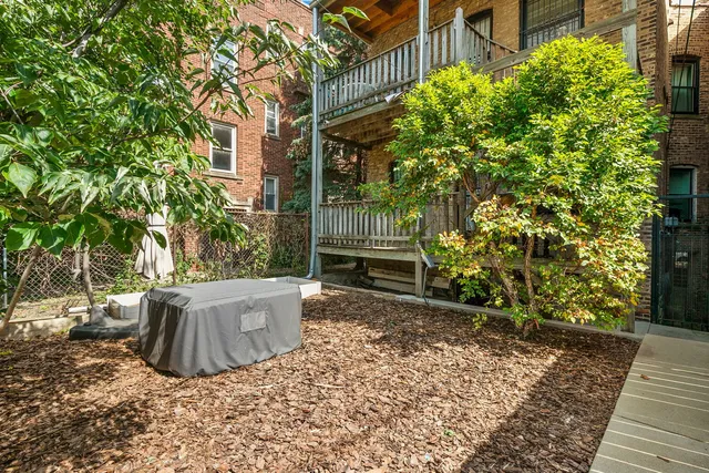 a view of a back yard of the house