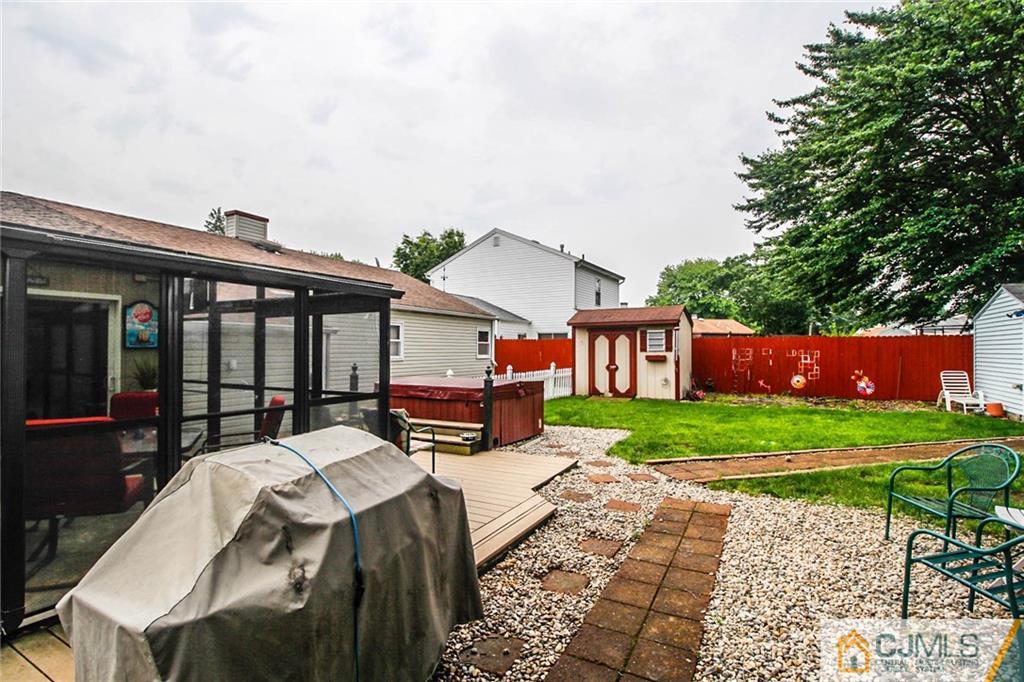 24 Raleigh Road Edison, NJ 08817 - Photo 22 of 25 a view of outdoor space yard deck and patio