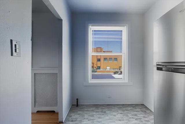 a view of an empty room and window