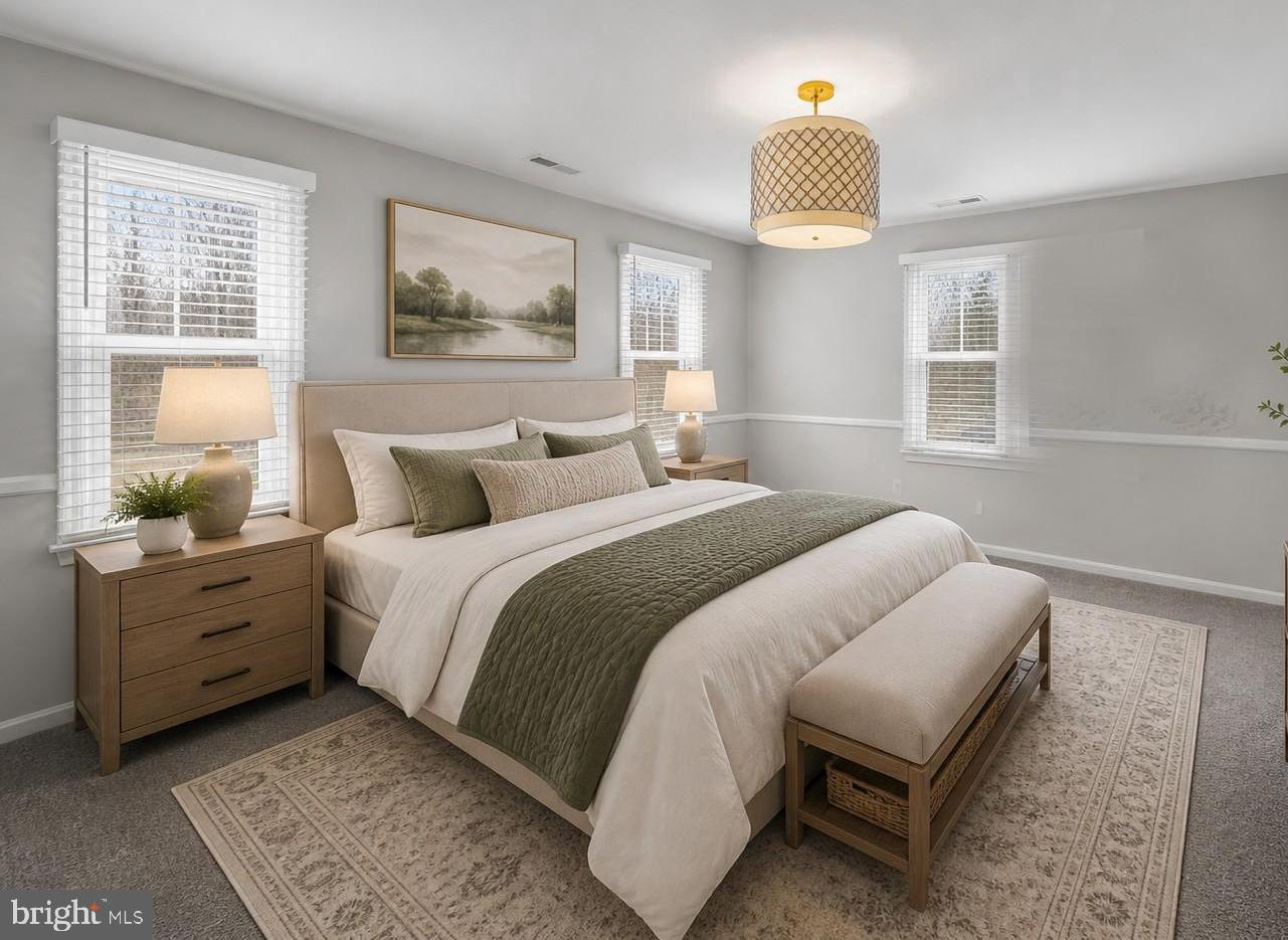 3484 Olympia Road Davidsonville, MD 21035 - Photo 30 of 50 a bedroom with a bed and a window