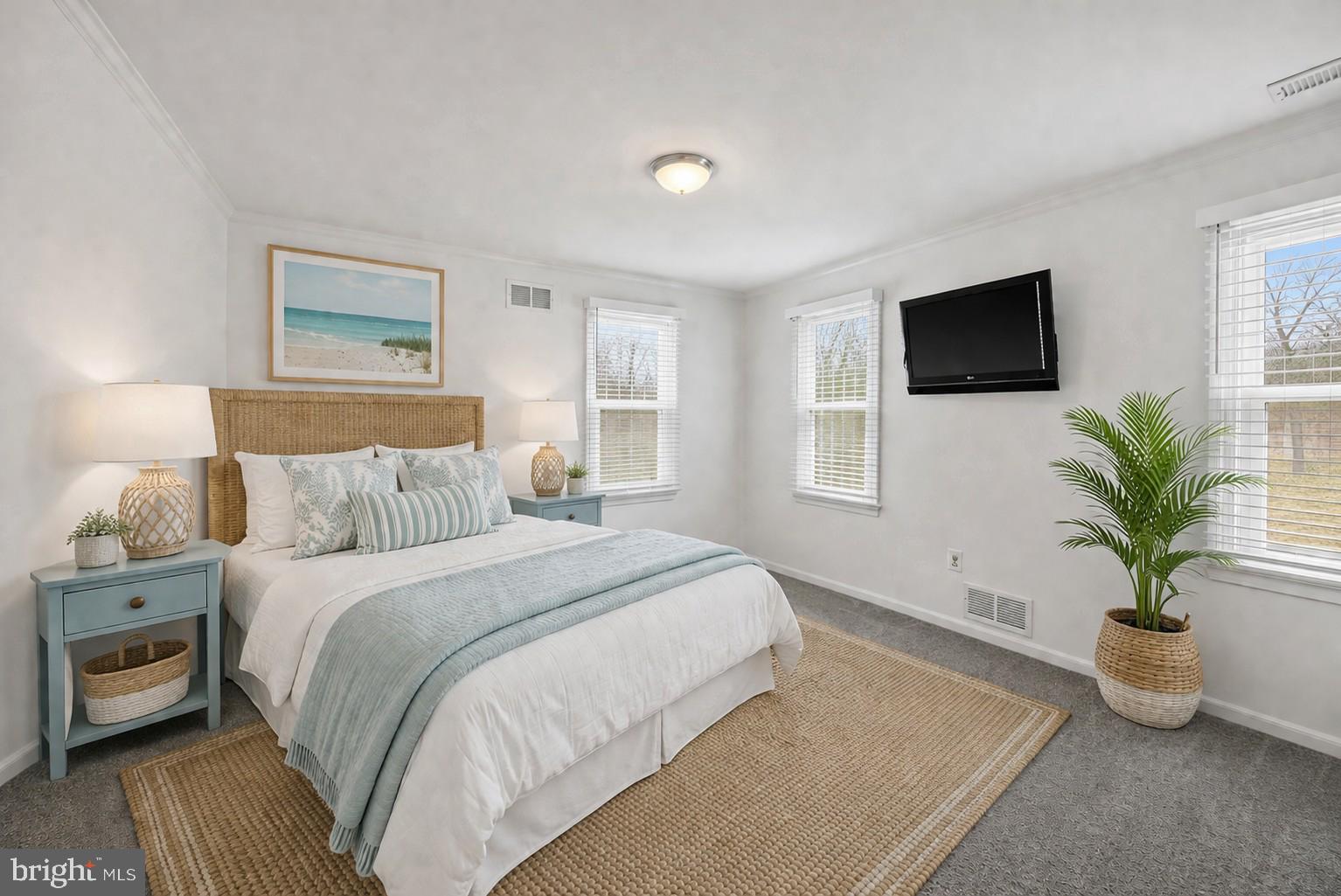3484 Olympia Road Davidsonville, MD 21035 - Photo 32 of 50 a bedroom with a bed and a television
