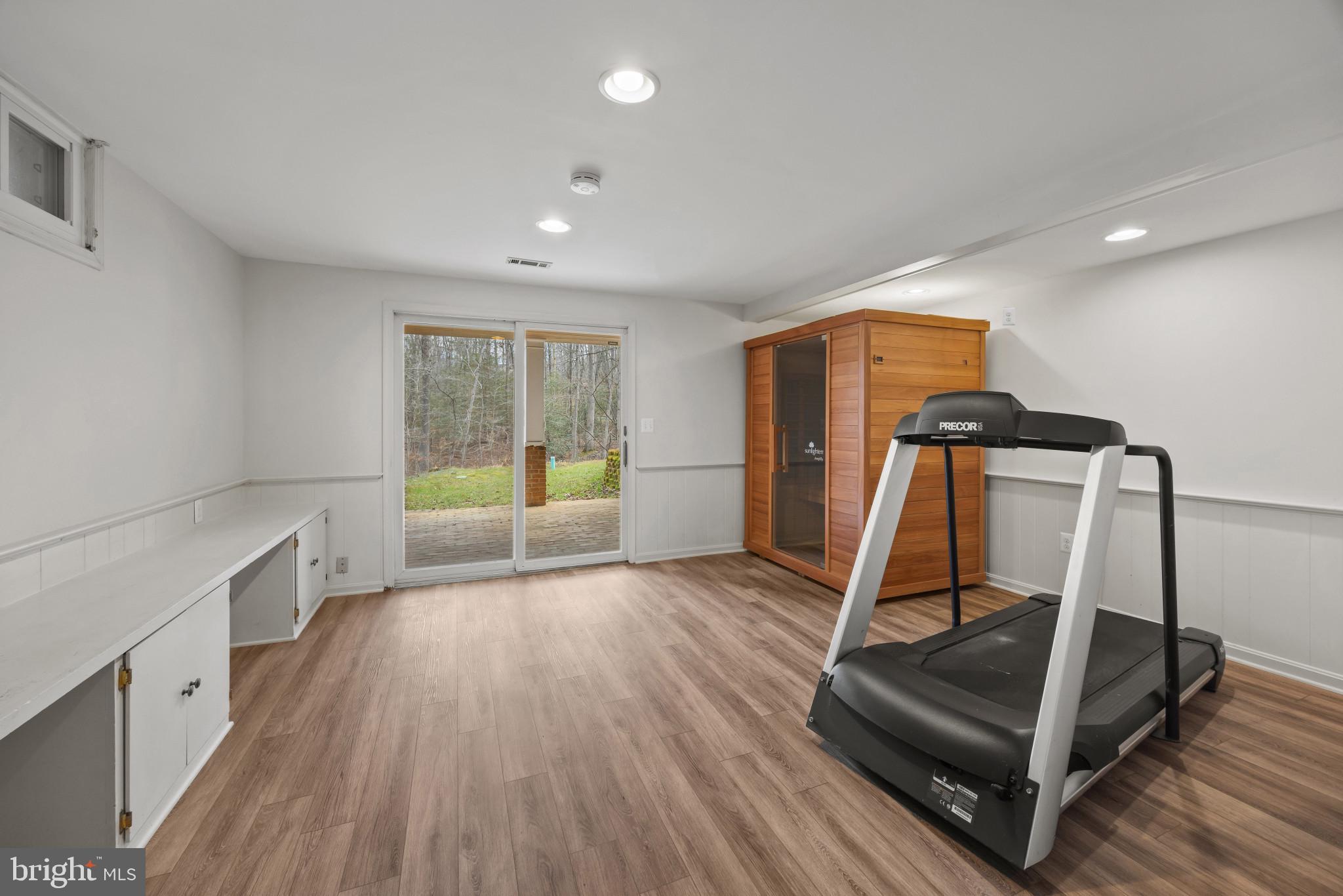 3484 Olympia Road Davidsonville, MD 21035 - Photo 34 of 50 a view of a room with gym equipment