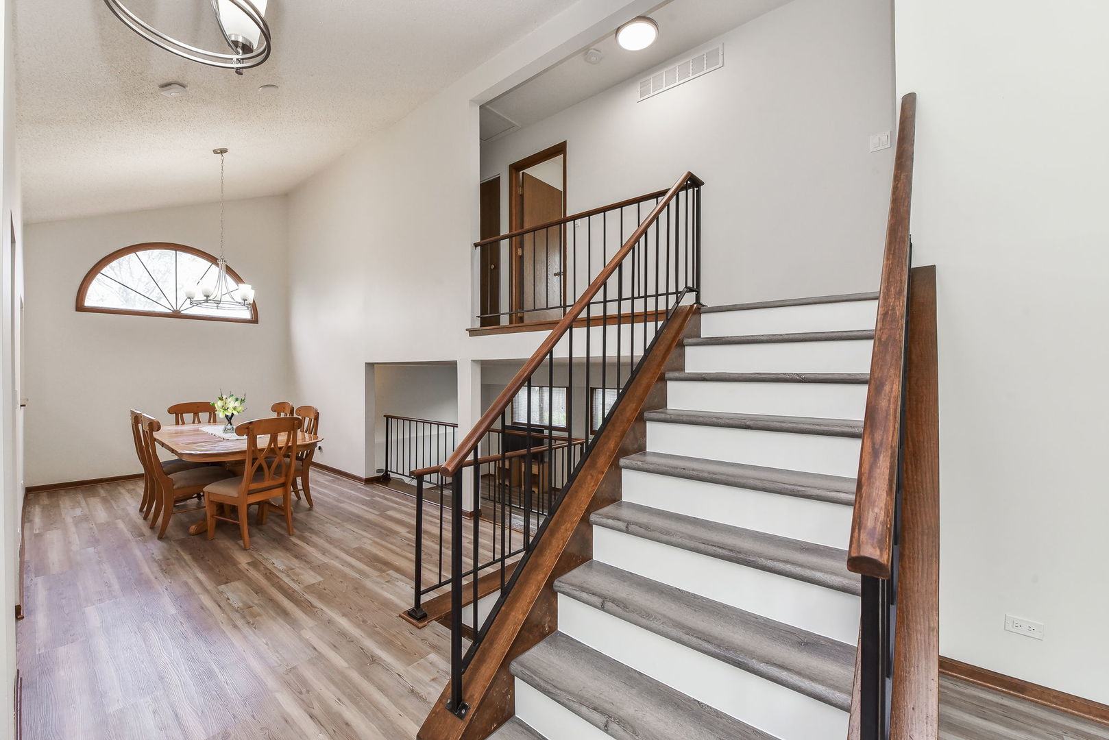 1920 Howe Lane Hanover Park, IL 60133 - Photo 15 of 25 a view of a livingroom with furniture wooden floor window and entryway