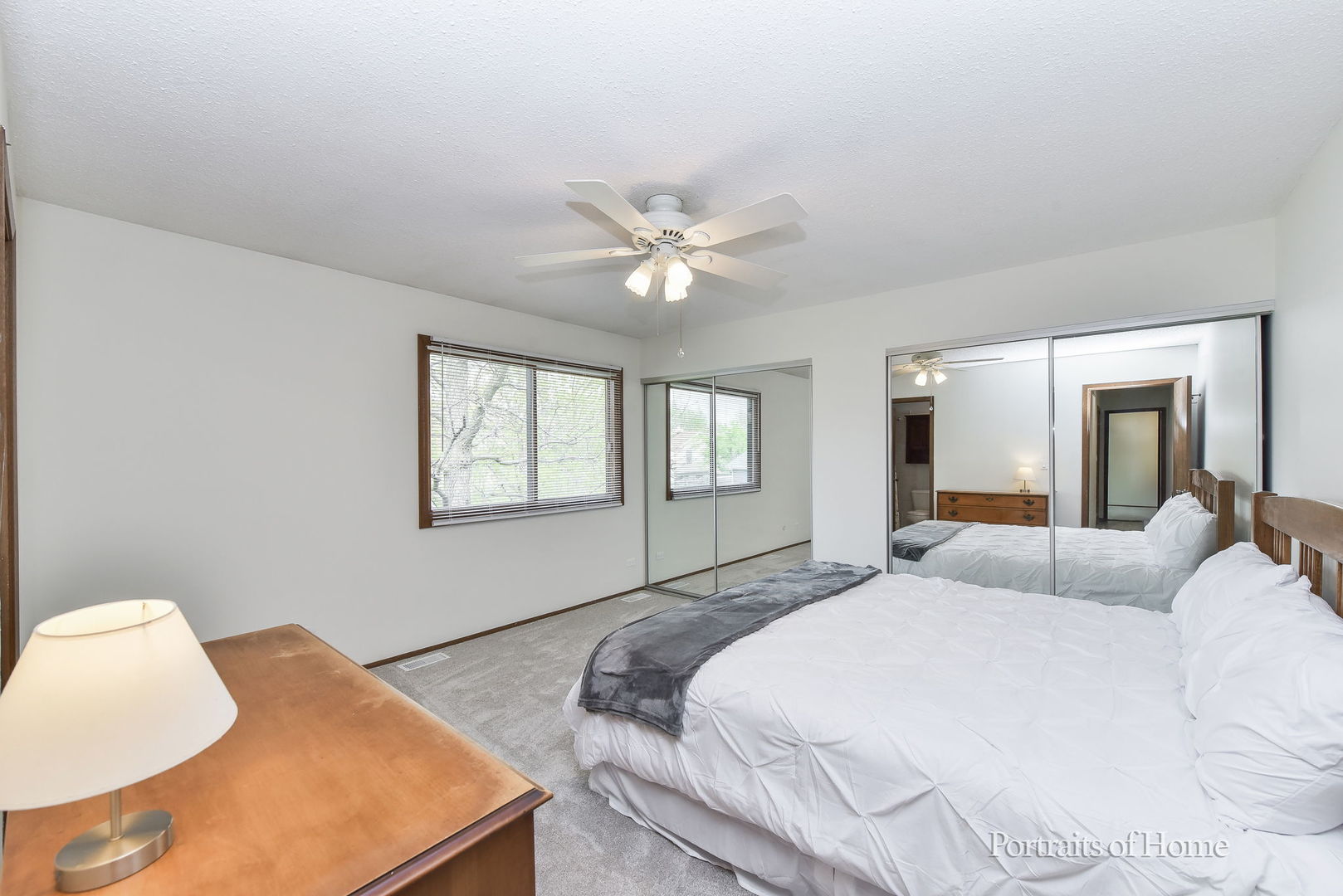 1920 Howe Lane Hanover Park, IL 60133 - Photo 16 of 25 a bedroom with a bed and a large window with outer view