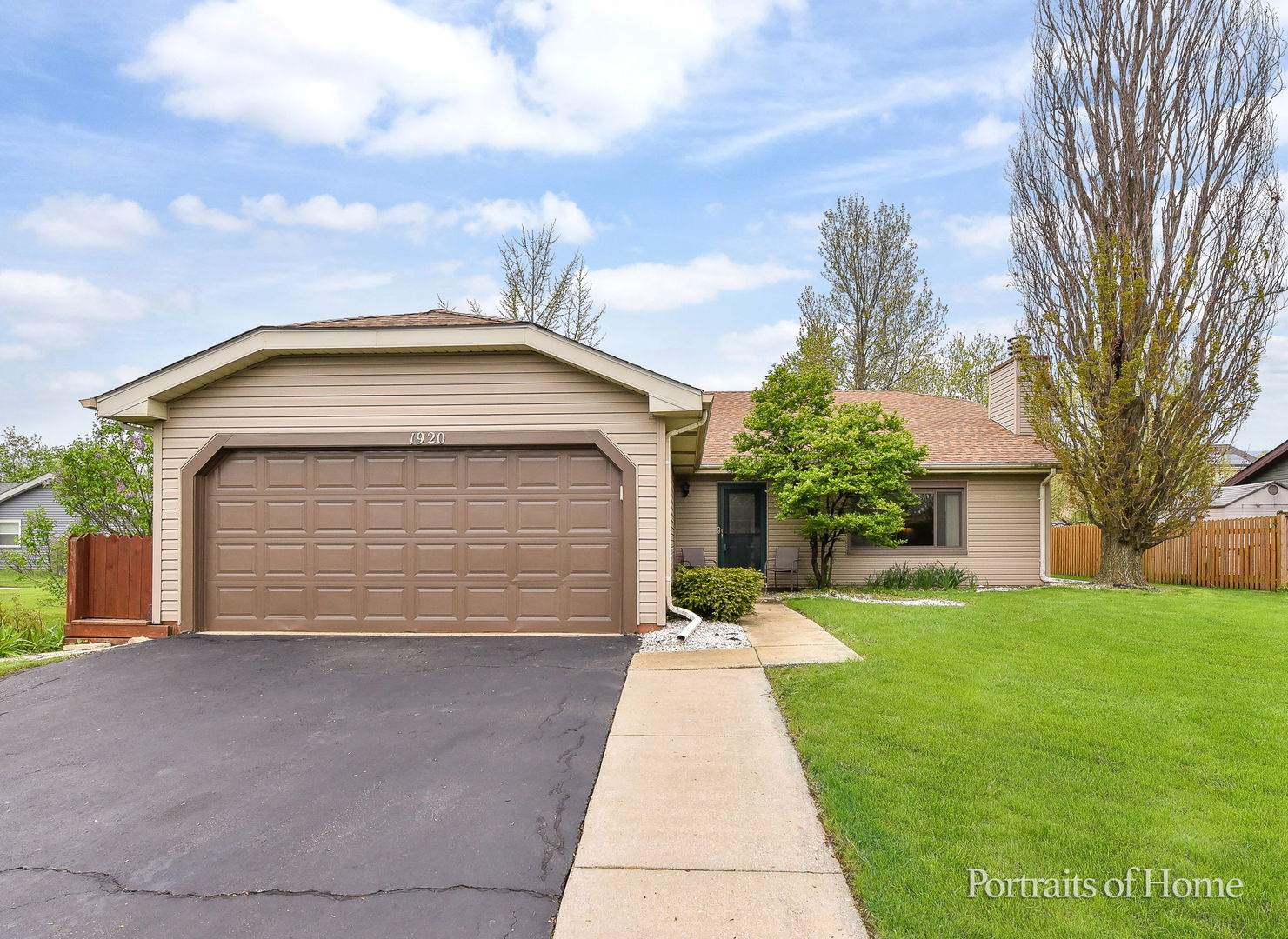 1920 Howe Lane Hanover Park, IL 60133 - Photo 3 of 25 a front view of house with yard