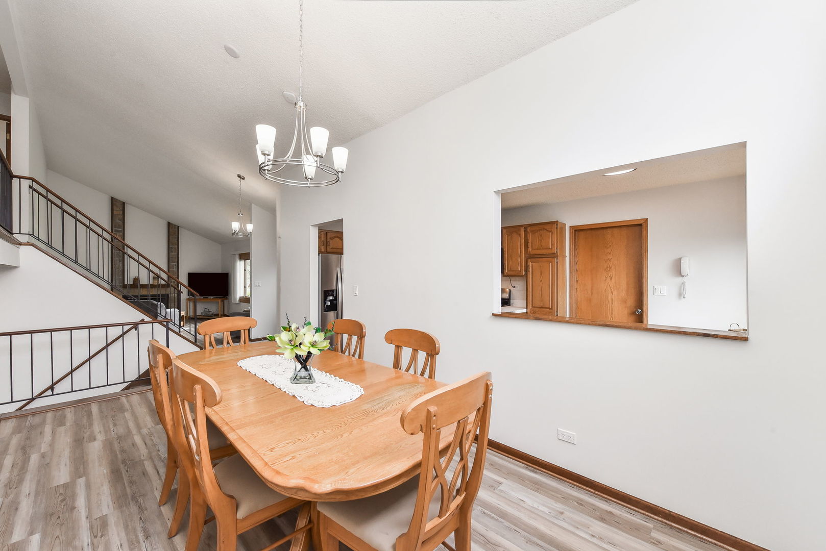 1920 Howe Lane Hanover Park, IL 60133 - Photo 9 of 25 a view of a dining room with furniture and wooden floor