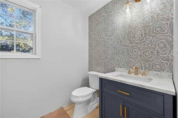 a bathroom with a sink and a toilet