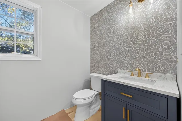 a bathroom with a sink and a toilet