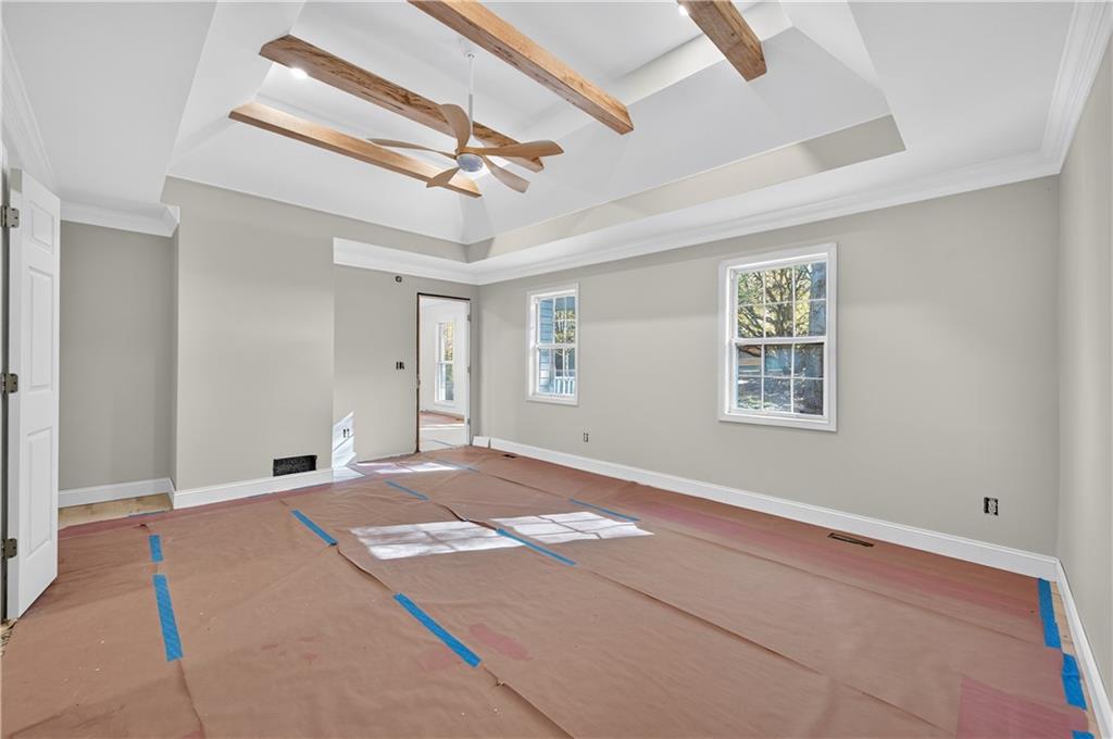 4460 Suwanee Dam Road Suwanee, GA 30024 - Photo 22 of 38 a view of an empty room with a window