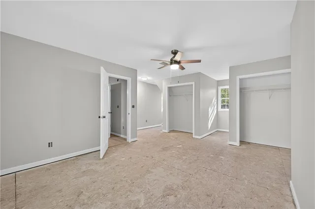 an empty room with a bathroom