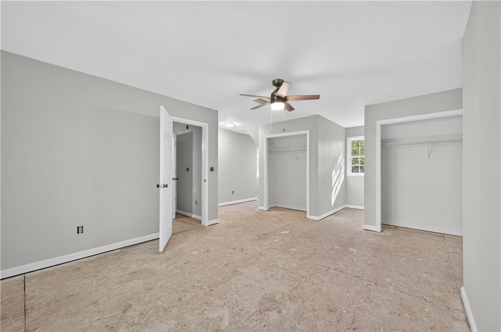 4460 Suwanee Dam Road Suwanee, GA 30024 - Photo 27 of 38 an empty room with a bathroom