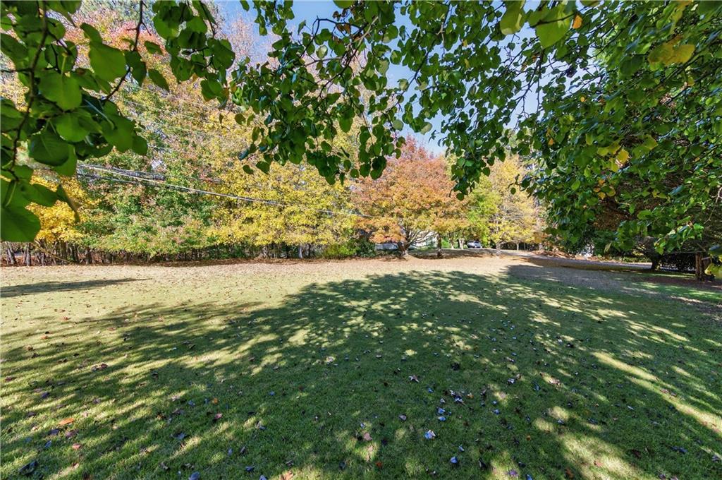 4460 Suwanee Dam Road Suwanee, GA 30024 - Photo 37 of 38 a view of yard with green space