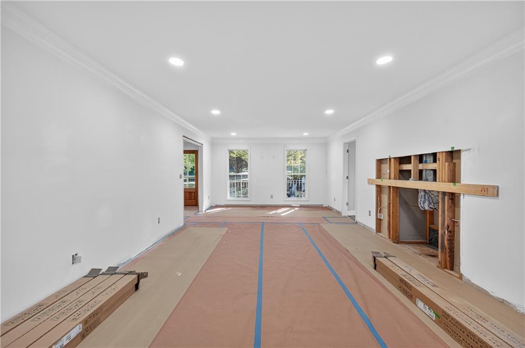 4460 Suwanee Dam Road Suwanee, GA 30024 - Photo 10 of 38 a view of livingroom with furniture and fireplace
