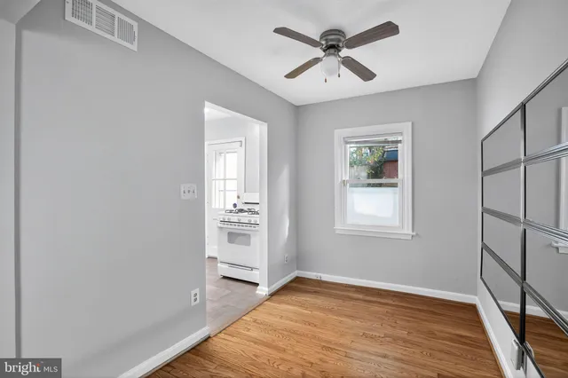 a kitchen with a stove and a refrigerator