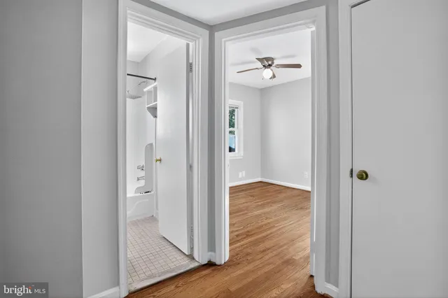a view of an empty room with stairs