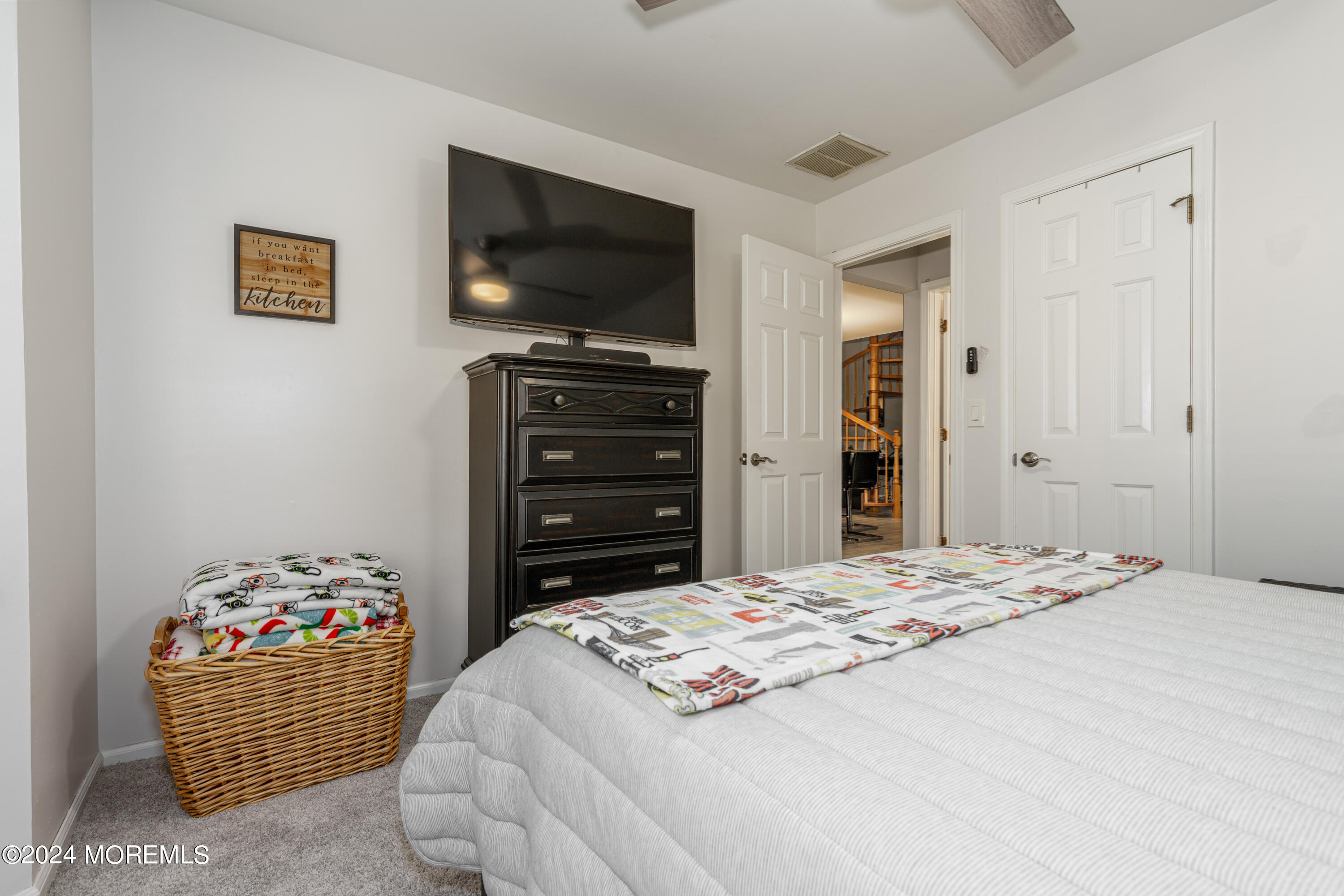 10 Cherrywood Circle Brick, NJ 08724 - Photo 11 of 27 a bedroom with a bed and a flat screen tv