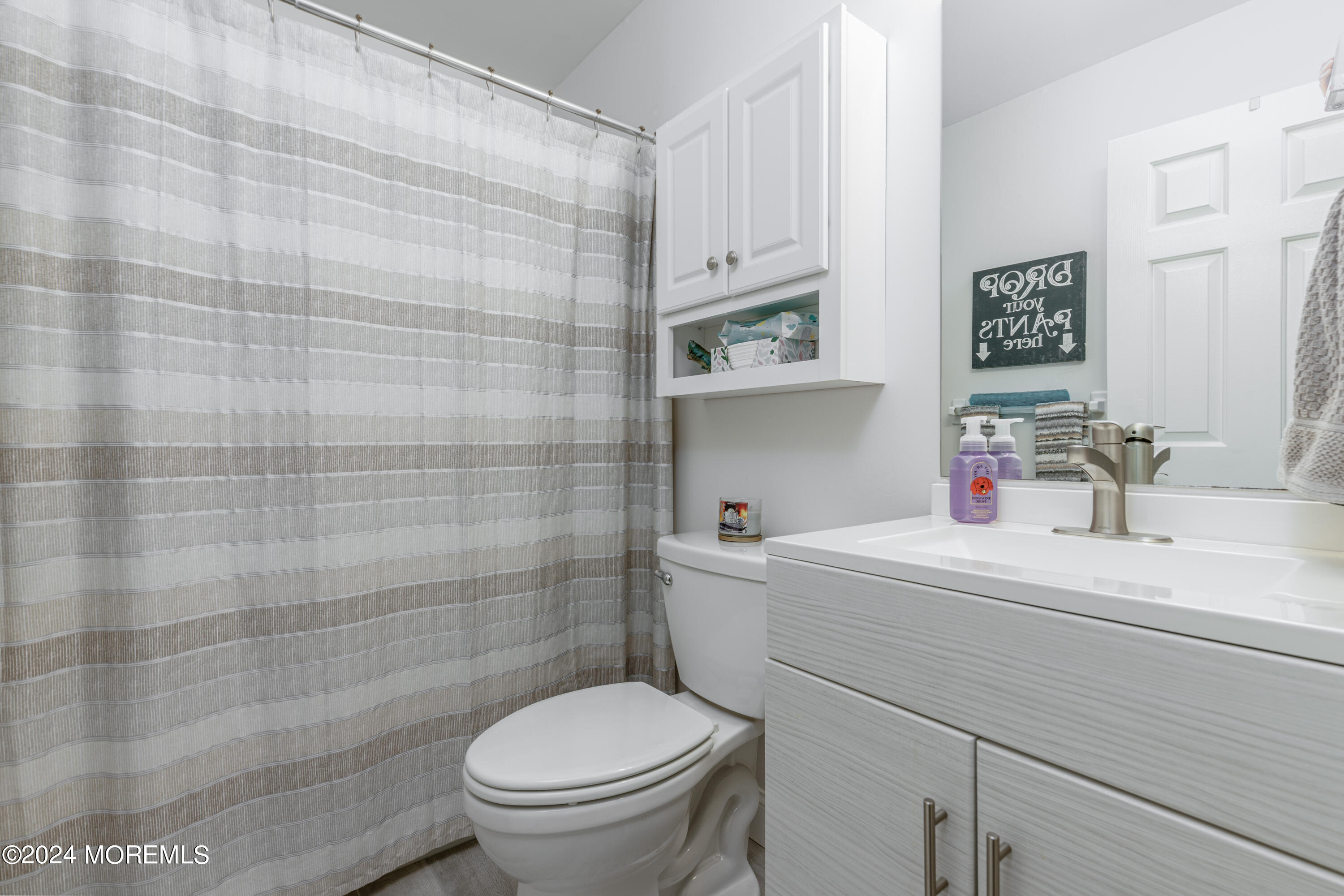 10 Cherrywood Circle Brick, NJ 08724 - Photo 12 of 27 a bathroom with a sink toilet and shower