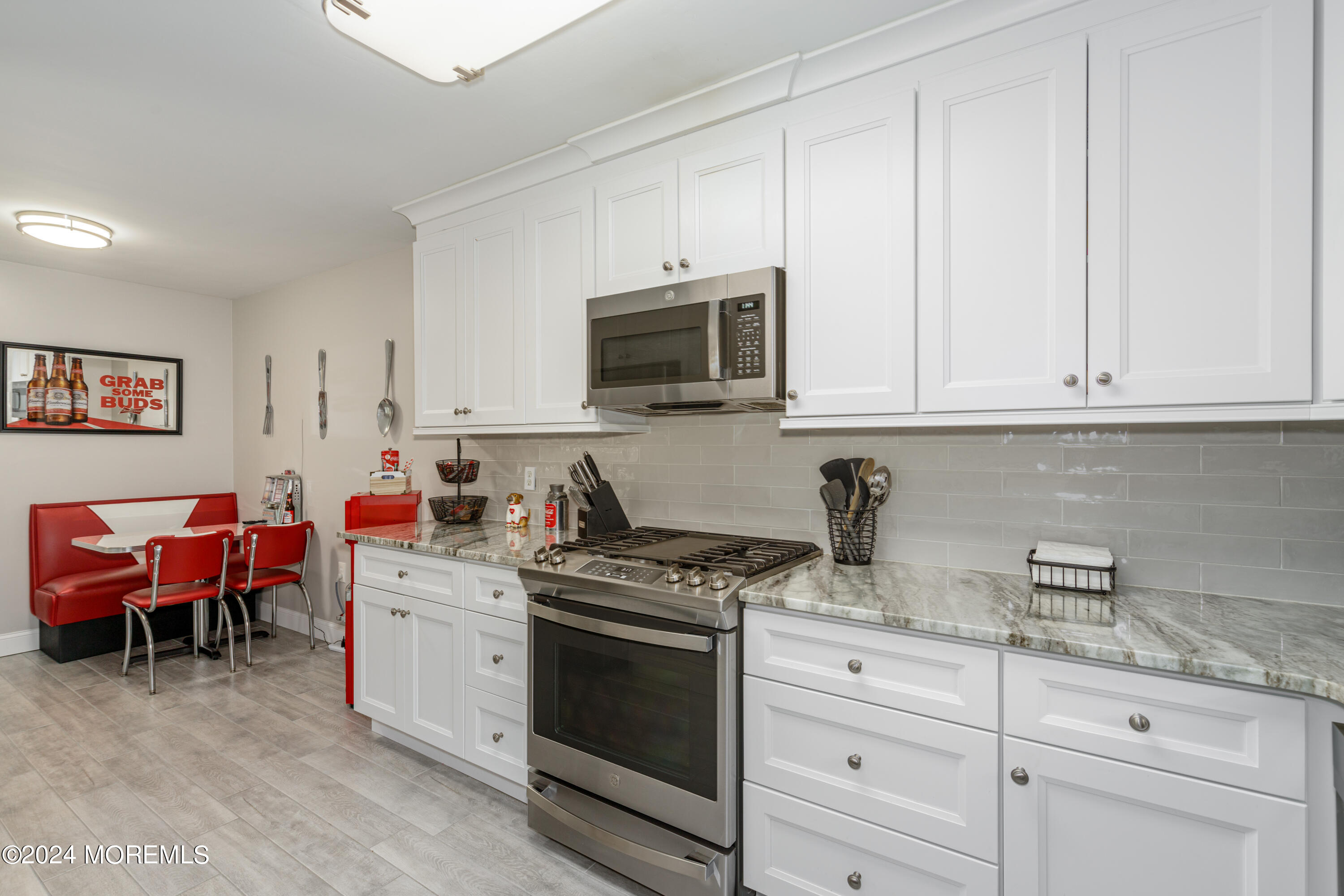 10 Cherrywood Circle Brick, NJ 08724 - Photo 6 of 27 a kitchen with cabinets appliances and a counter space
