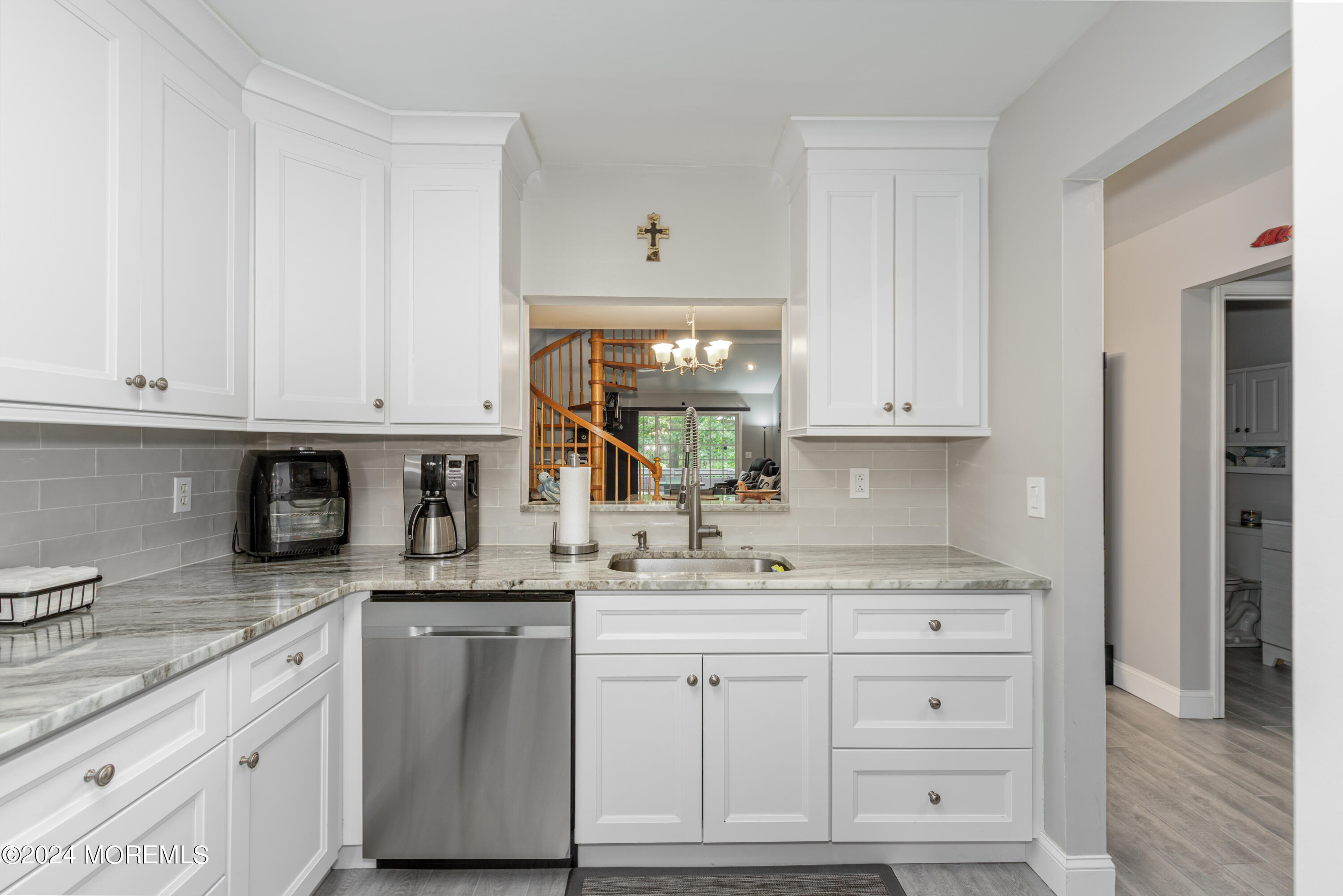 10 Cherrywood Circle Brick, NJ 08724 - Photo 7 of 27 a kitchen with appliances cabinets and a sink