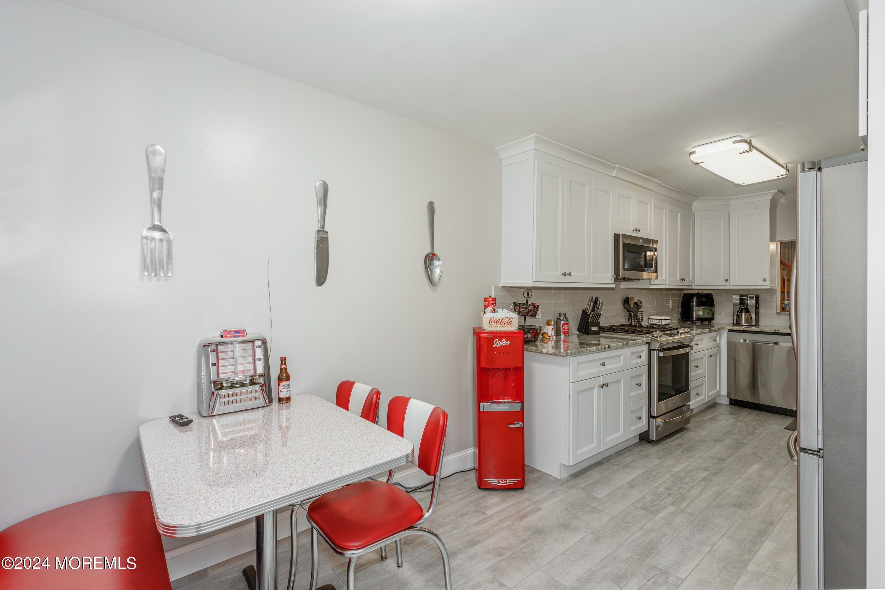 10 Cherrywood Circle Brick, NJ 08724 - Photo 8 of 27 a kitchen with a sink and cabinets