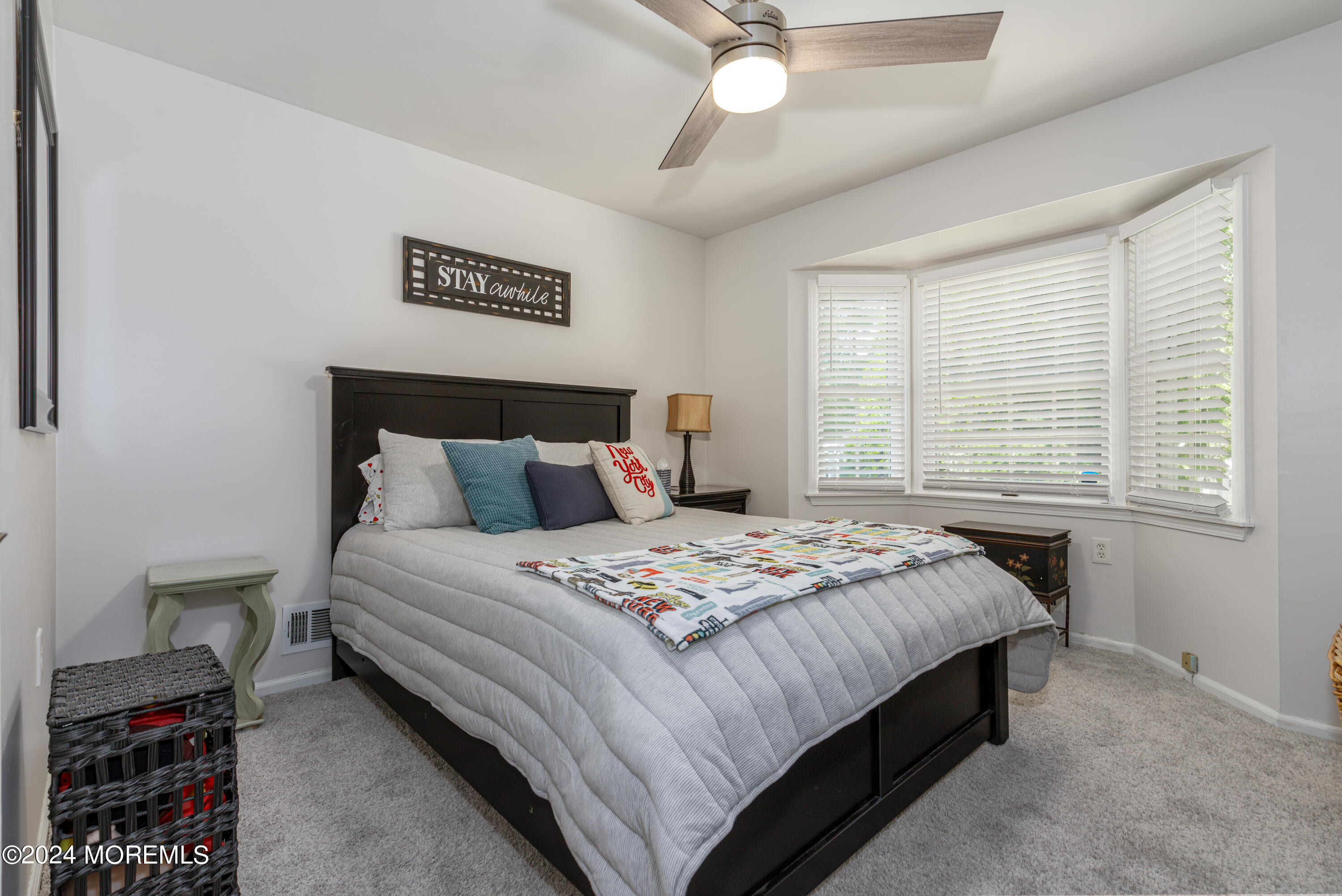 10 Cherrywood Circle Brick, NJ 08724 - Photo 10 of 27 a bedroom with a bed and a window