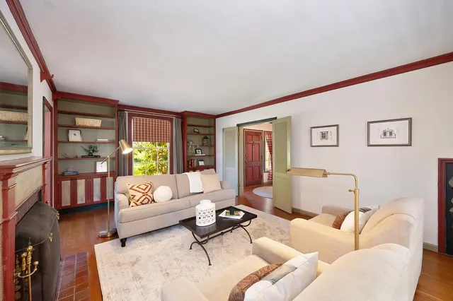 a view of a patio with a table chairs and a table